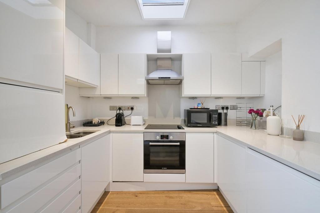 Cozy Hideaway In South Ken! Apartment ลอนดอน ภายนอก รูปภาพ